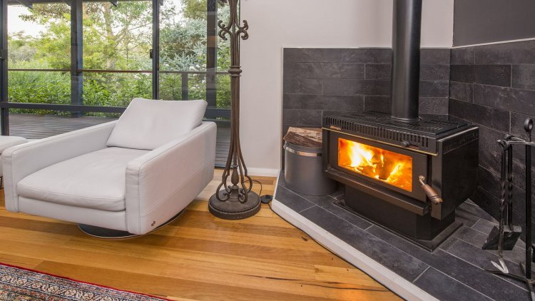 custom homes built by MSky Homes in Margaret River South West WA, Lounge by the fireplace