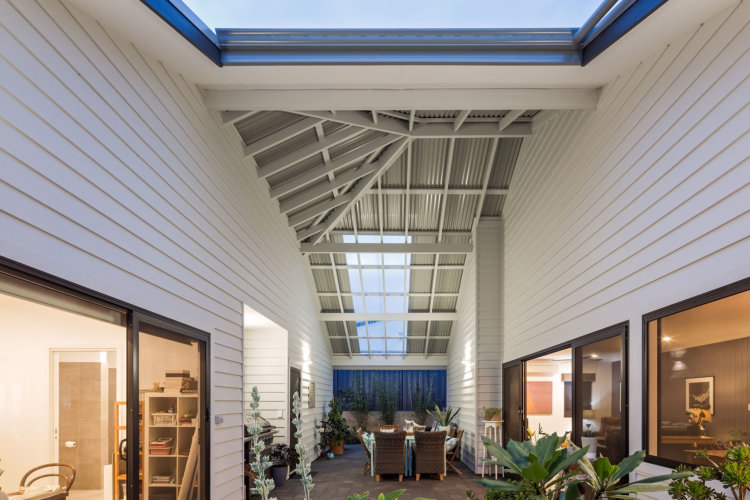Central courtyard using James Hardies Linea Cladding and exposed rafters, built in the coastal town of Dunsborough